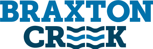The image shows the Braxton Creek logo, which features the name "Braxton Creek" in bold, blue capital letters. The word "Creek" has blue wavy lines incorporated into the lettering, mimicking the appearance of flowing water.